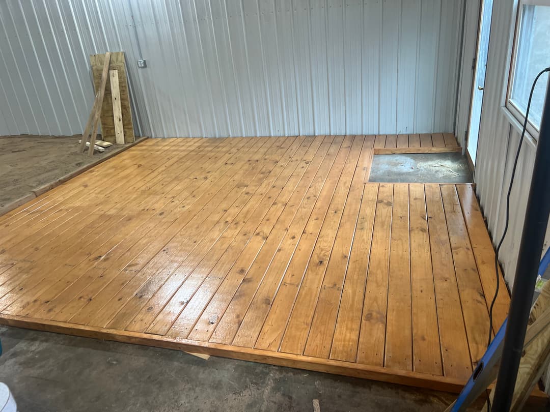 newly installed deck with stained wood